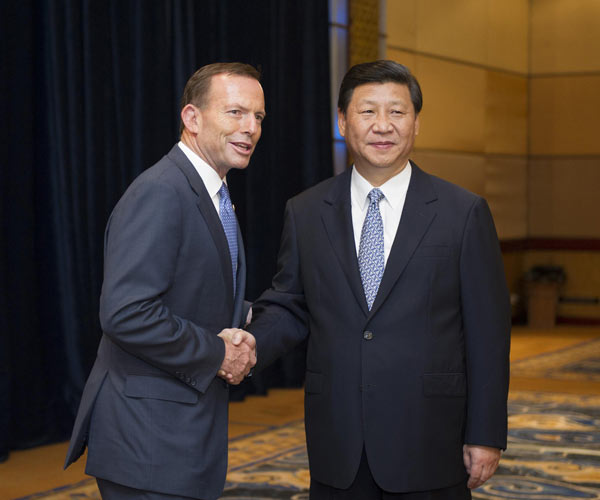 on Sunday ahead of the 21st informal economic leaders' meeting of the Asia-Pacific Economic Cooperation forum on the Indonesian resort island of Bali. Chinese, Australian leaders pledge to boost ties