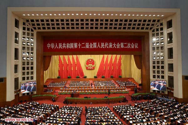 Top legislator delivers NPC Standing Committee work report