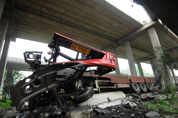Truck driver injured in bridge cave-in Truck driver injured in bridge cave-in