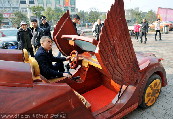 Farmer builds sports car out of wood
