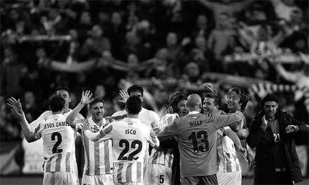 Malaga defies debts to join Euro elite