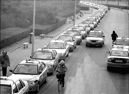 Beijing cabbies fear loss of business