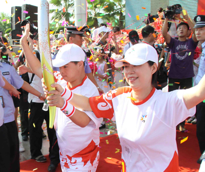 第五屆全國特奧運(yùn)動會火炬?zhèn)鬟f首站開跑(圖)