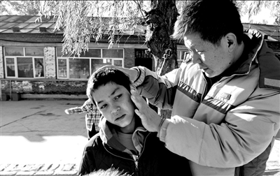 航天工程師辭職做打工子弟校校長自掏腰包維持學校