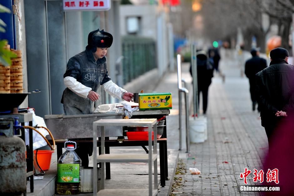 中國(guó)多地大風(fēng)降溫 京城迎入冬最冷一天