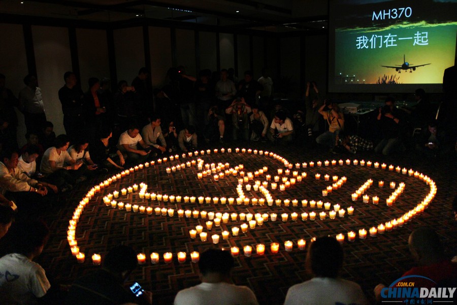 馬航MH370失聯(lián)客機整月 家屬為親人祈福守望