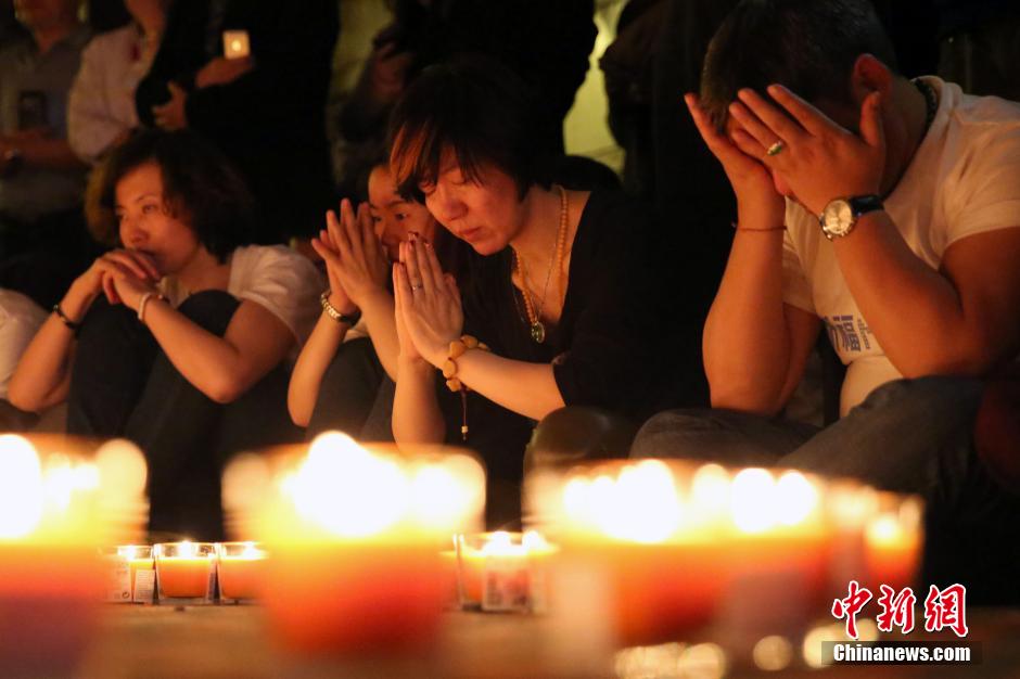 MH370航班失聯(lián)滿月 在京乘客家屬舉行祈?；顒?dòng)