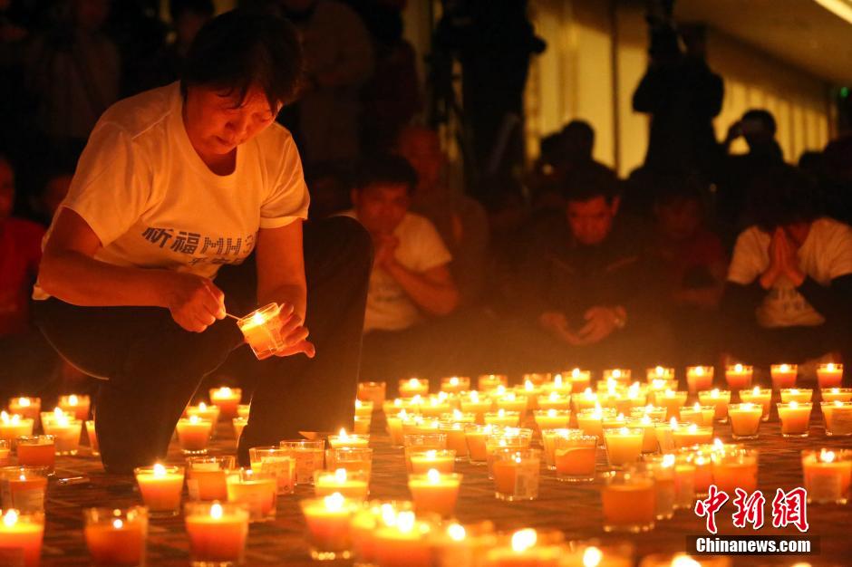 MH370航班失聯(lián)滿月 在京乘客家屬舉行祈福活動(dòng)