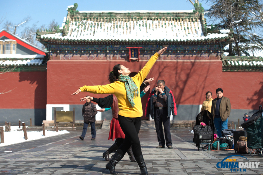 中國(guó)日?qǐng)?bào)直擊北京三月春雪