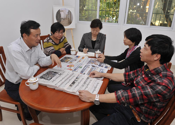 海口市委常委、宣傳部長吳川祝走訪中國日報海南記者站