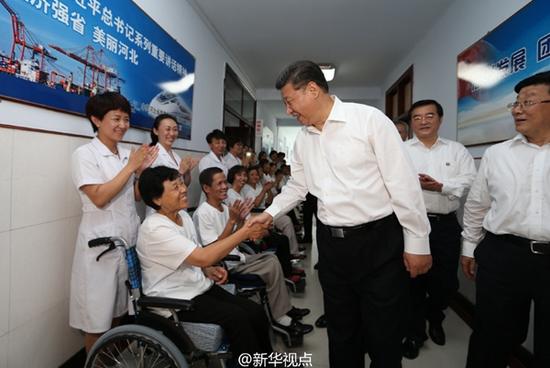 習近平：全面建成小康社會，殘疾人一個也不能少