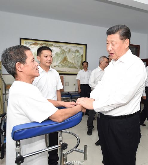 習近平：全面建成小康社會，殘疾人一個也不能少