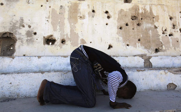 Training in a bullet-riddled stadium where the remains of a rocket propelled grenade lies discarded on the track's edge counts as progress for Somali Olympic hopeful Mohamed Hassan Mohamed. In former rebel camp, Somali athletes eye London