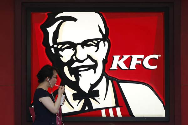 Yum trims full-year outlook as sales ebb