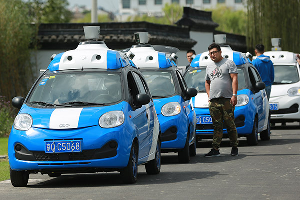 Companies team up to get ahead in autonomous driving race