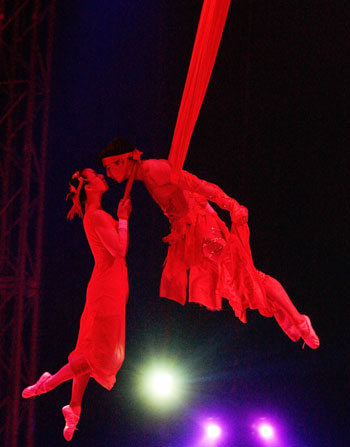 Acrobats from the Great Chinese State Circus perform during their show 'Yin Yang' in Burgos, northern Spain April 20, 2006. The Circus is more than 2,000 years old, with artists beginning studies at the age of six to become talented performers from 10 -18 years of age. The circus, featuring about 60 acrobats, is directed by gymnast Li Xining and is currently touring Spain. Picture taken April 20, 2006. 
