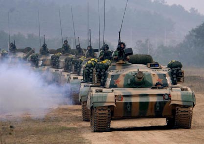 Chinese soldiers take part in a war exercise under the code name 