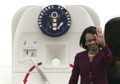 U.S. Secretary of State Condoleezza Rice waves as she arrives at Beijing airport October 20, 2006. Rice began a trip to China on Friday, aiming to convince sceptical Beijing to escalate pressure on North Korea over its nuclear programme. 