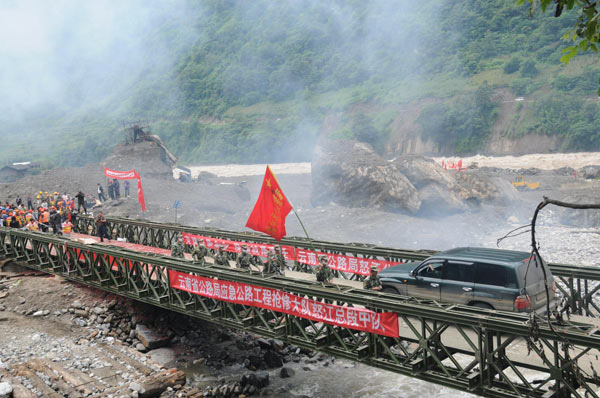 After mudslide, a new bridge