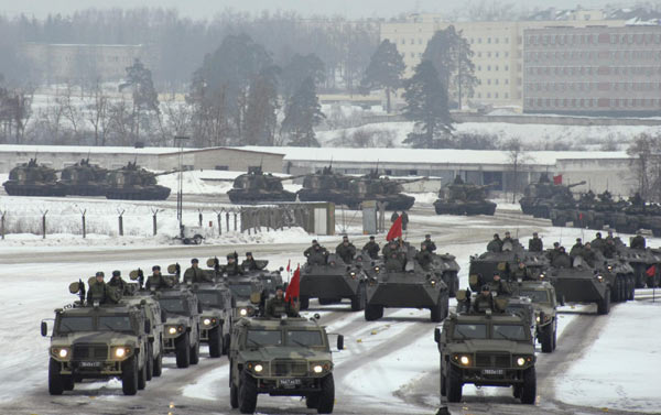 Servicemen operate Russian armoured personnel carriers during a rehearsal for the annual Victory Day parade at a base near the settlement of Alabino, some 30 km (19 miles) south-west of the capital Moscow March 19, 2012. Rehearsal for Russian Victory Day parade