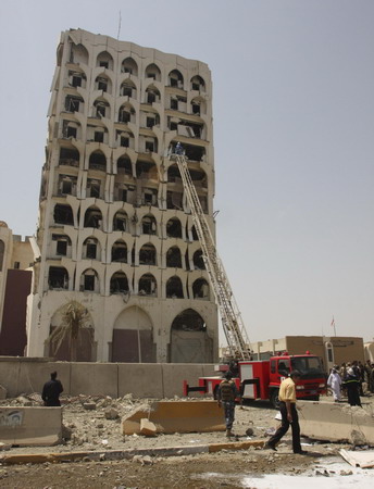 Waves of Baghdad blasts kill 97