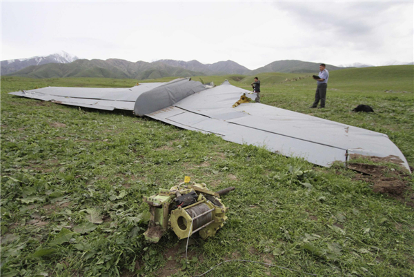 A view shows the wreckage of the Boeing KC-135 Stratotanker plane near the site of its crash near the Kyrgyz village of Chaldovar, May 3, 2013. US military plane crashes in S. Kyrgyzstan