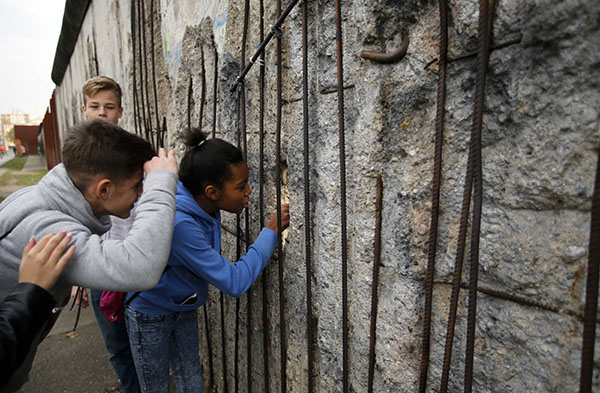 Two cities suffer contrasting fate after Berlin Wall