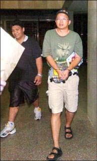 大陸游客被指偷拍臺(tái)軍機(jī)密營(yíng)區(qū)遭逮捕(組圖)