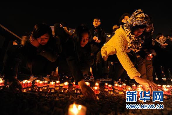 南京為大屠殺遇難者舉行“和平燭光祭”（圖）
