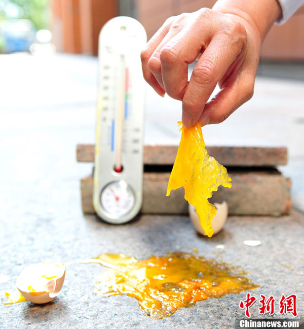 上海連續(xù)7天溫度超38℃ 滾燙地面能“煎”雞蛋
