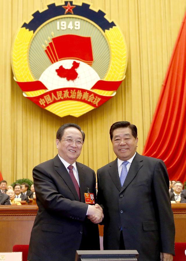 賈慶林和俞正聲親切握手