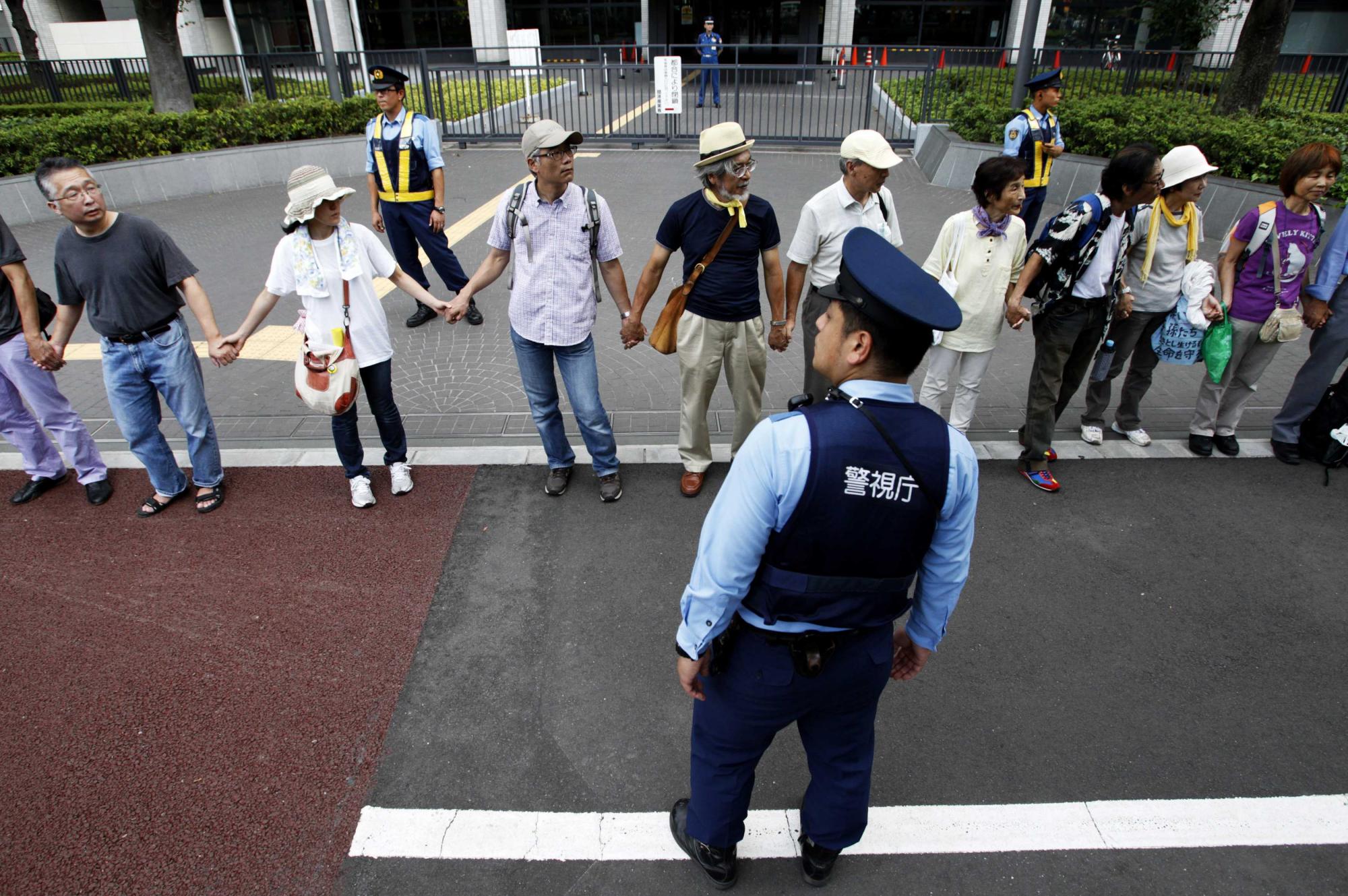 日本紀念3·11地震半周年 新內(nèi)閣默哀、多地爆發(fā)反核示威