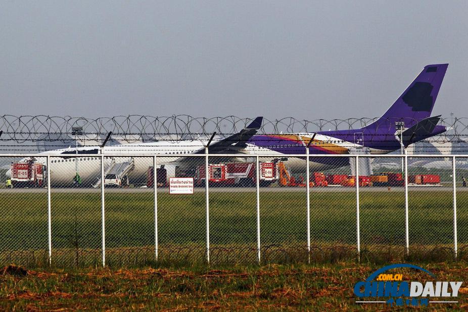 泰航一飛機(jī)因故障沖出跑道 9名中國乘客受傷（高清組圖）