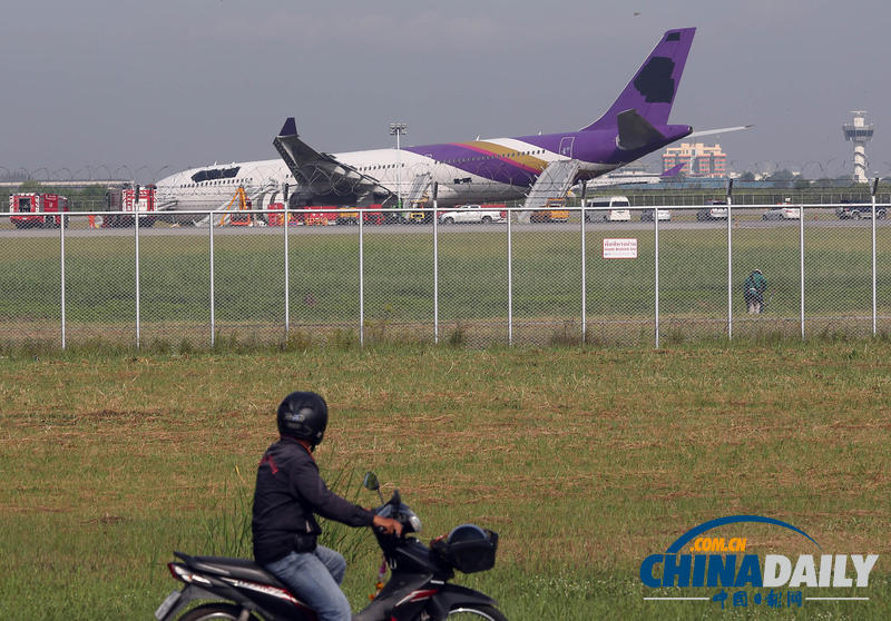 泰航一飛機(jī)因故障沖出跑道 9名中國(guó)乘客受傷（高清組圖）