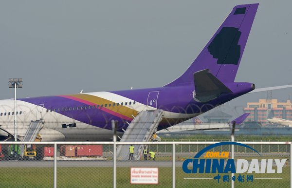 泰航一飛機(jī)因故障沖出跑道 9名中國乘客受傷（高清組圖）