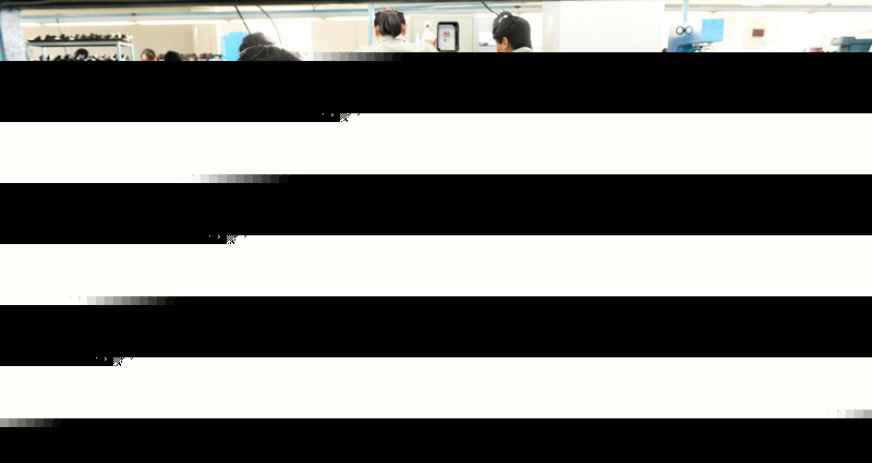 開城工業(yè)園區(qū)重啟第二天 朝鮮工人忙碌工作（圖）