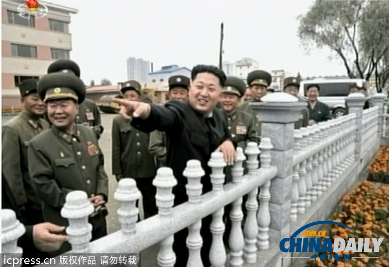 金正恩視察朝鮮蘑菇研究院 喜笑顏開(kāi)（圖）