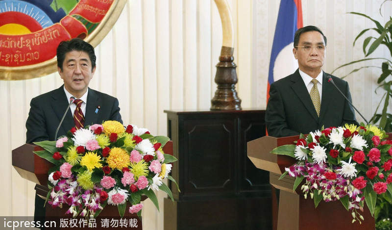 安倍晉三訪問老撾 以金援換支持“入常”（圖）