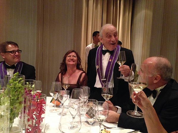 Marcel Greenberg, a longtime member of Chaine des Rotisseurs, toasts fellow guests. Photo by Mike Peters / China Daily A gathering of gourmets