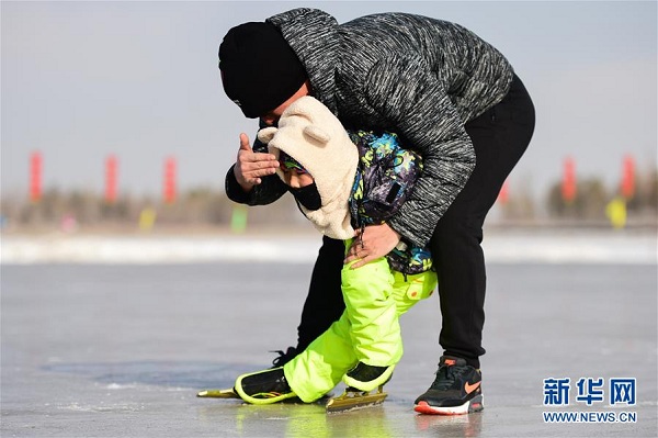 Ice skating on frozen Xilin Lake