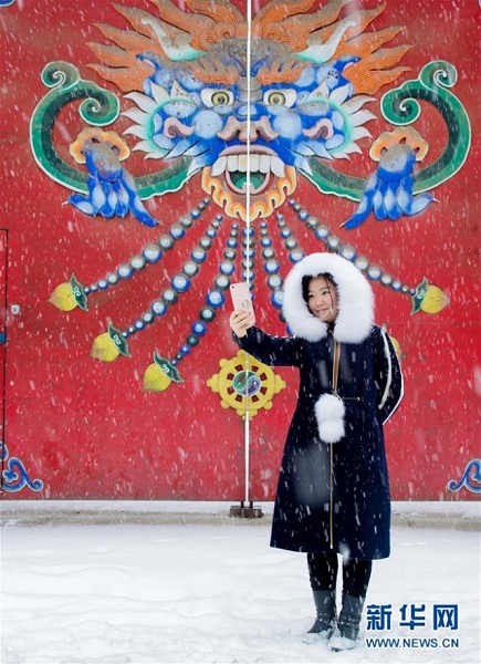 Spring snow blankets Hohhot