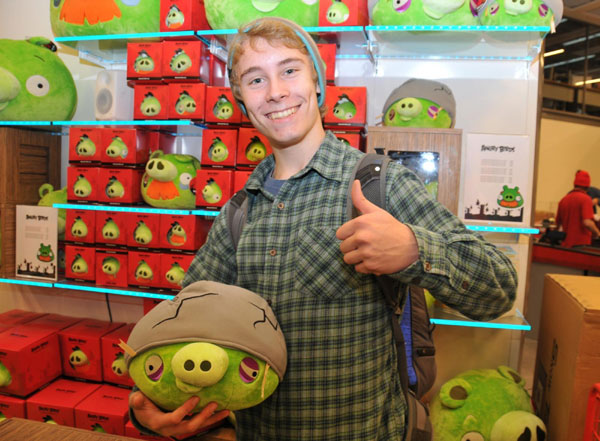 A fan of Angry Birds buys products at the first official Angry Birds store, which opened in Helsinki on Friday. 1st Angry Birds shop opens in its birthplace