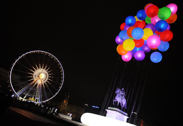 Balloons with lights float away during the Festival of Lights in Lyon, France, Dec 11, 2011. Festival of Lights marked in Lyon