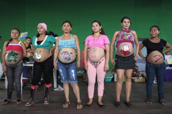 Mothers-to-be show off painted bellies