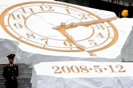 China remembers quake victims one year on