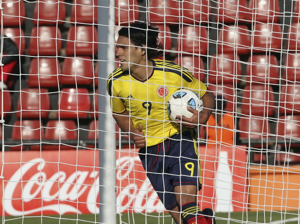 Colombia's Radamel Falcao Garcia celebrates his second goal against Bolivia in their first round match of the Copa America soccer tournament in Santa Fe, July 10, 2011. Colombia first to reach Copa America quarters