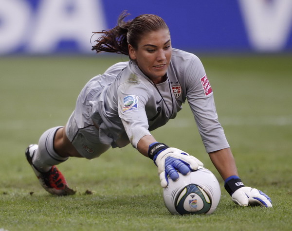 US goalkeeper Hope Solo makes a save during their Women's World Cup quarter-final soccer match against Brazil in Dresden July 10, 2011. Soccer: US eliminates Brazil to reach semis