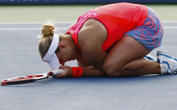 Wozniacki sets up semis against Serena, Stossur advances Wozniacki sets up semis against Serena