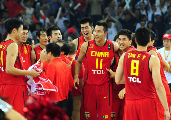 China's basketball men players celebrate their victory in the final of the Asian Men's Basketball Championships on Sunday. China beats Jordan to win Asian championship