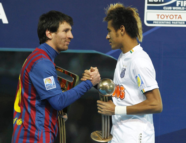 Lionel Messi scored two wonder goals as European champions Barcelona ripped apart Brazil's Santos 4-0 to win their second Club World Cup in swashbuckling style on Sunday. 'Invincible' Barca crush Santos to win Club World Cup
